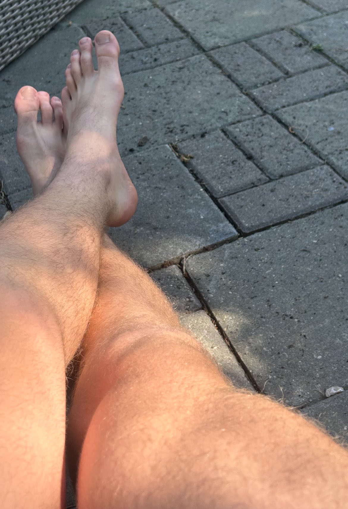 What’s hotter, my quad muscles, or the tops of my feet crossed outside in the sun? 